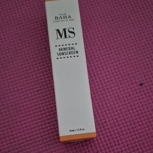 Orange and White Sunscreen Tube